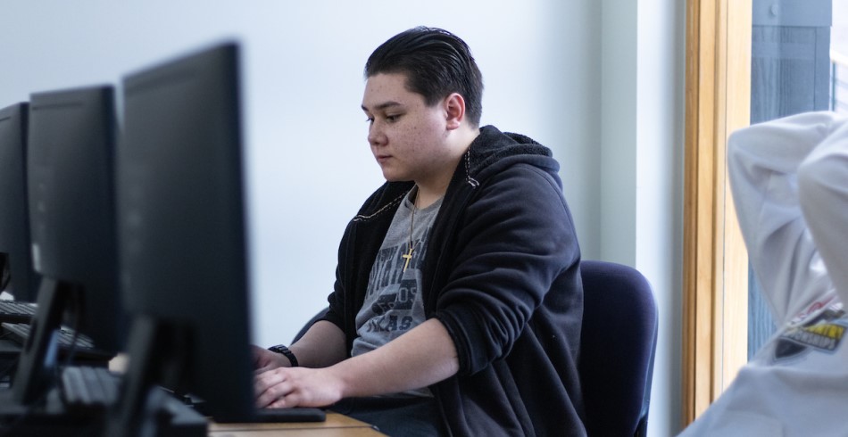 Concordia University Texas student working in a computer lab