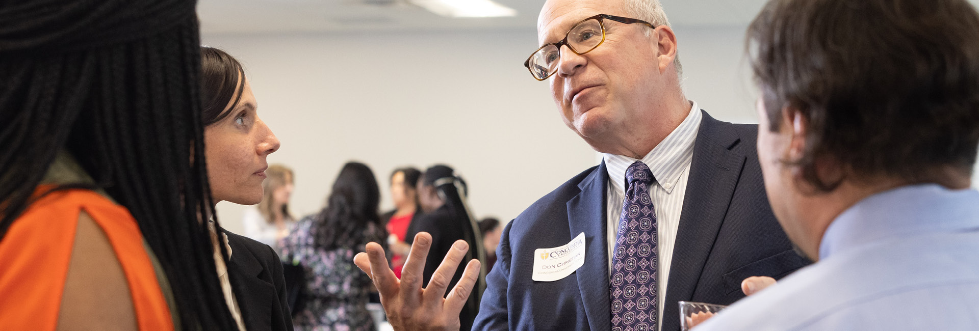 The President and Board Members conversing