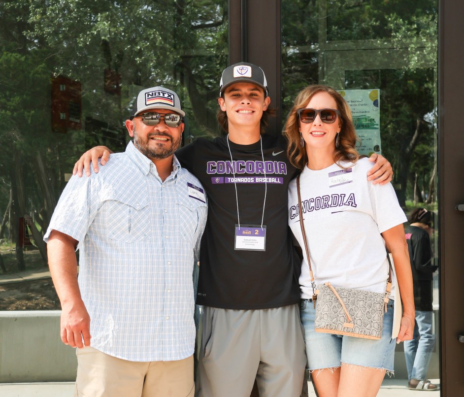Concordia University Texas student with proud parents