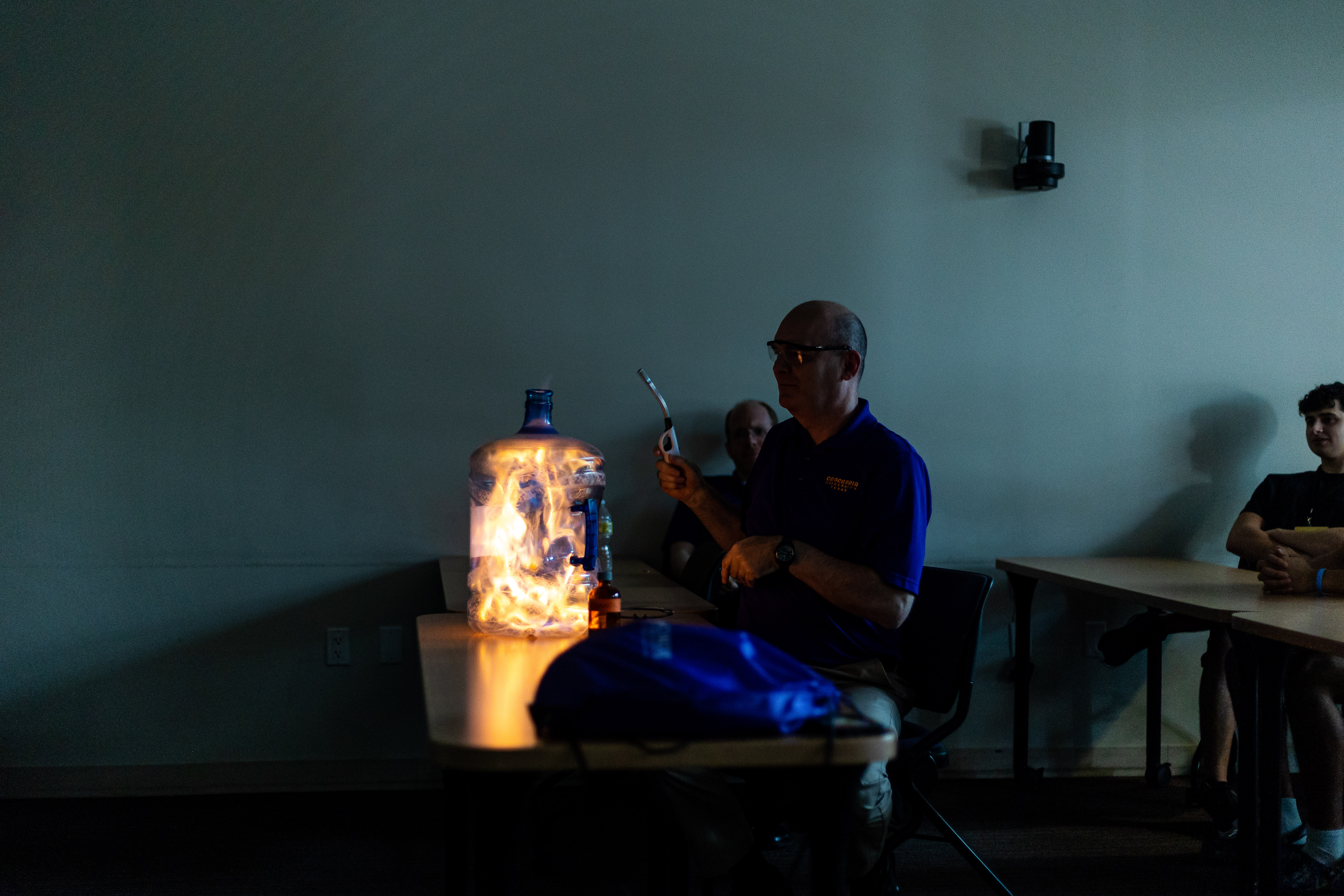 Chemistry A professor and a bottle of fire.