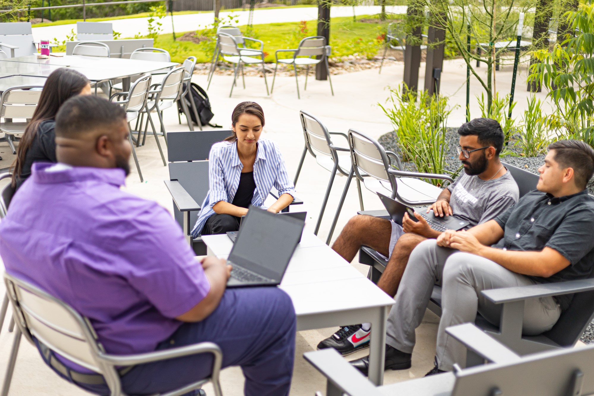 A group of students collaborating in a study group