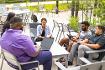 A group of students collaborating in a study group