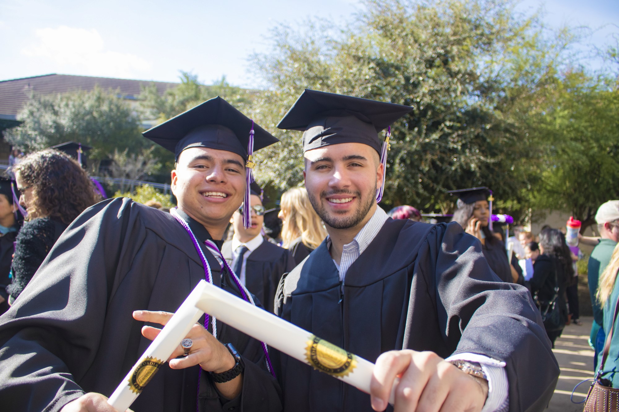 Two proud graduates