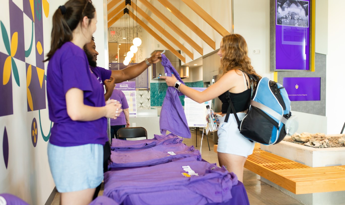 Concordia University Texas student getting a Tornado Nation shirt