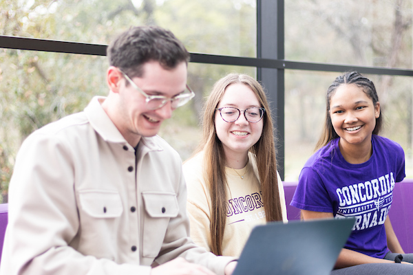 Concordia University Texas students collaborating on a project