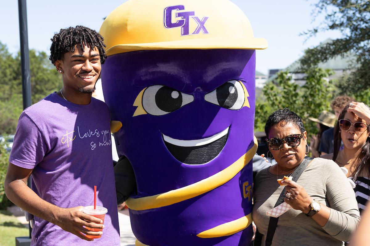 A family getting a picture with Vortex