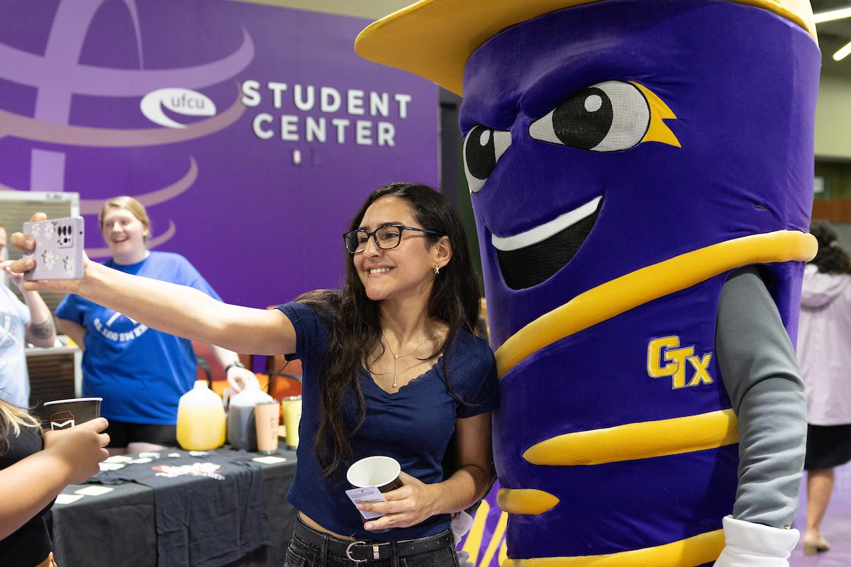 A student getting a selfie with Vortex