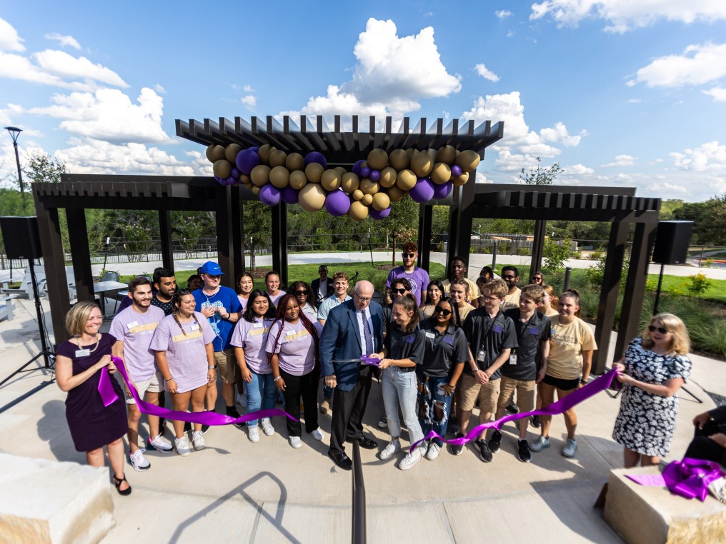 Ribbon cutting by students.