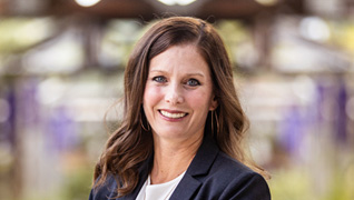 Headshot of Lynette Gillis, Chief Financial Officer & Vice President of Strategic Communications