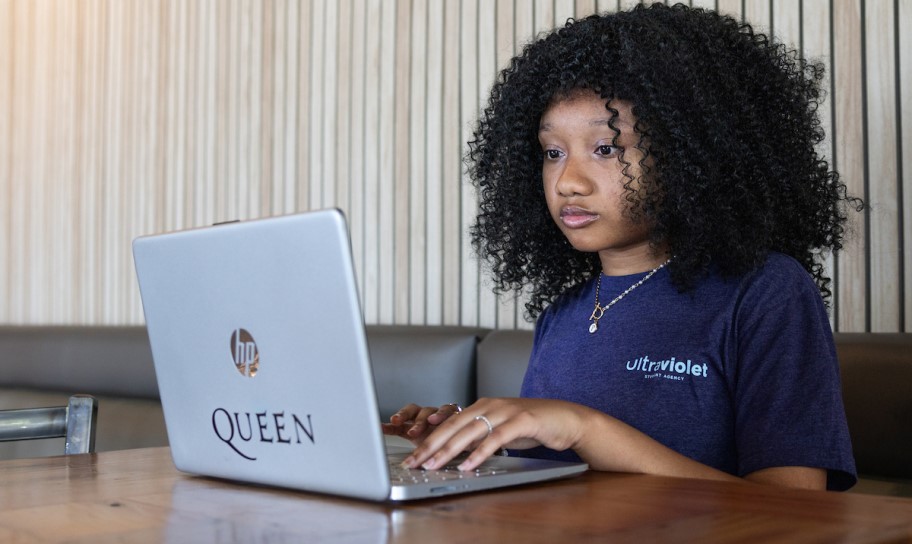 A young woman working on her laptop