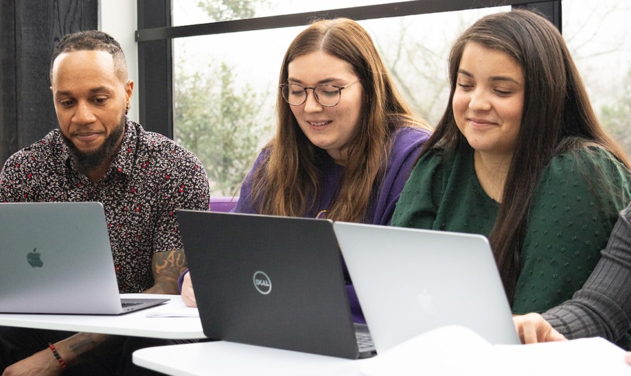 A group of students working on some research
