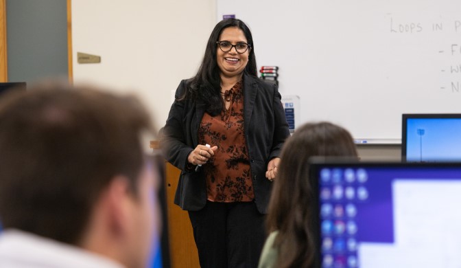 Dr. Bindu teaching a CS course