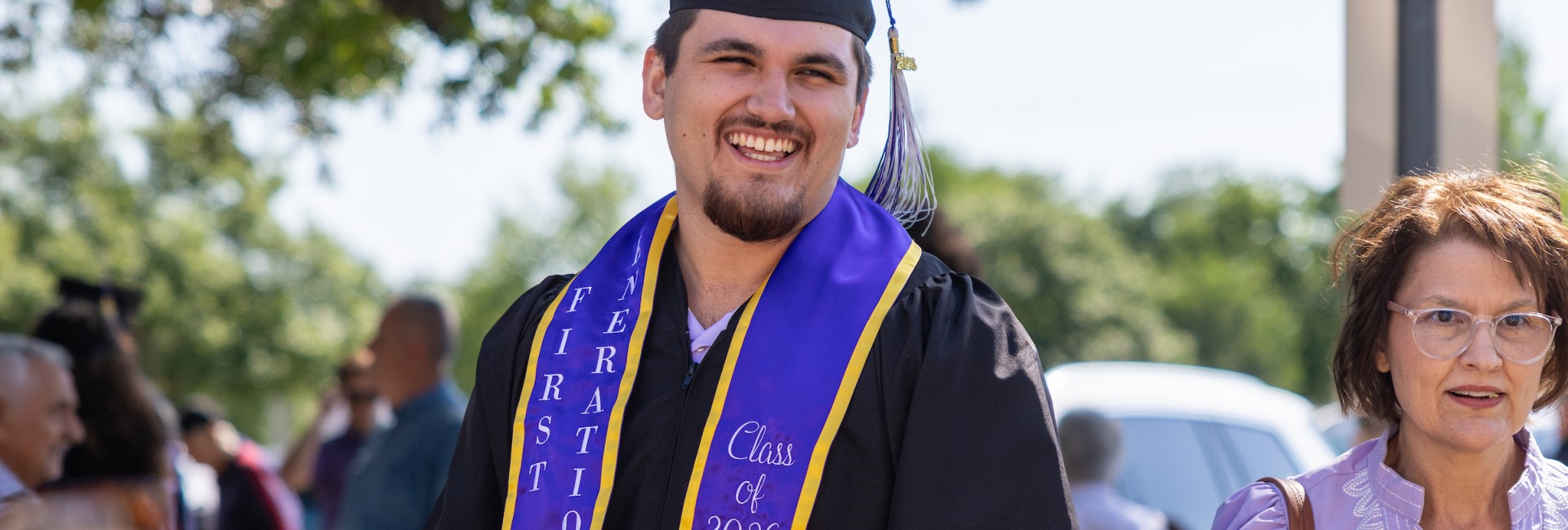 A student excited to be graduating