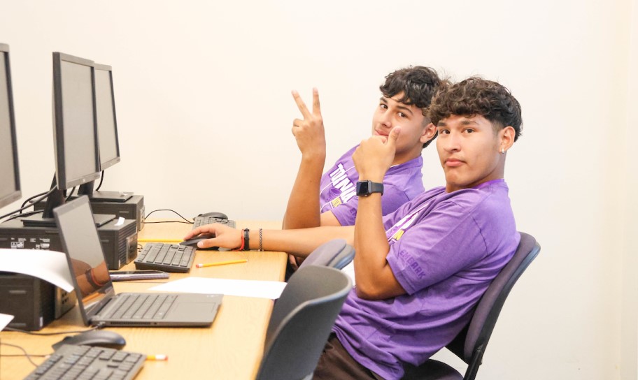 Two students in a campus computer lab