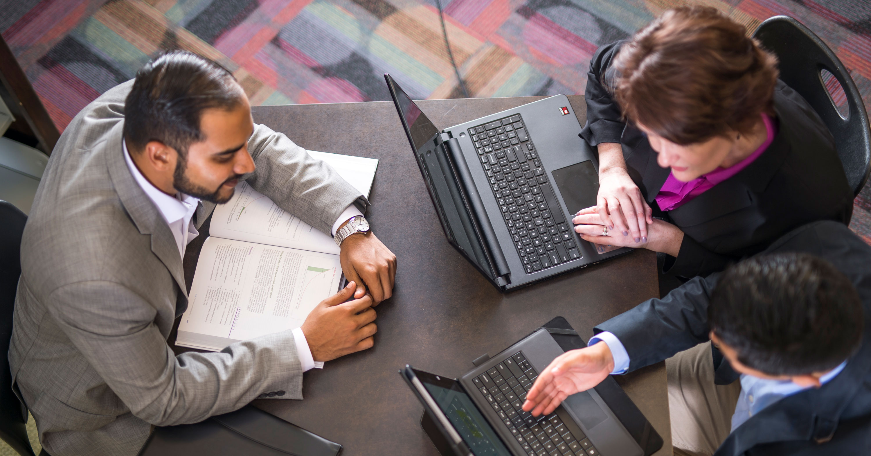 Professionals talking at table