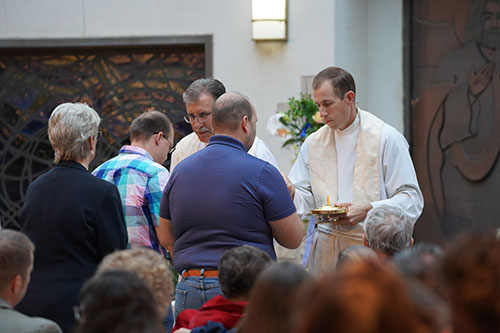 Chris Kennedy at church communion