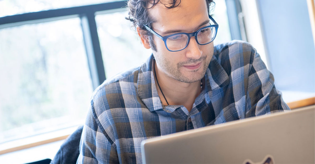 man working on laptop