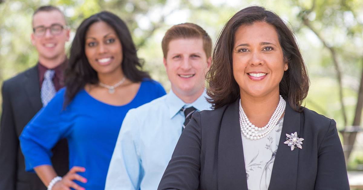 Masters degree adult students in professional attire