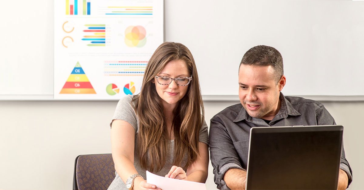 MBA students on laptop