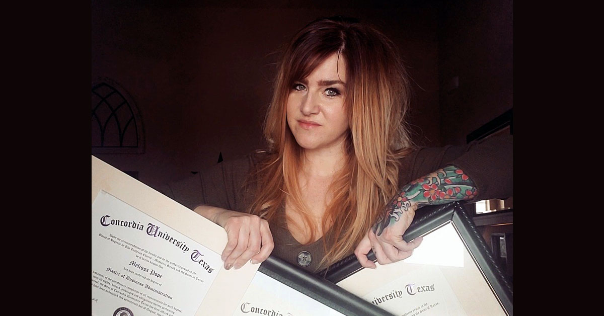Missy Pope holding CTX diplomas