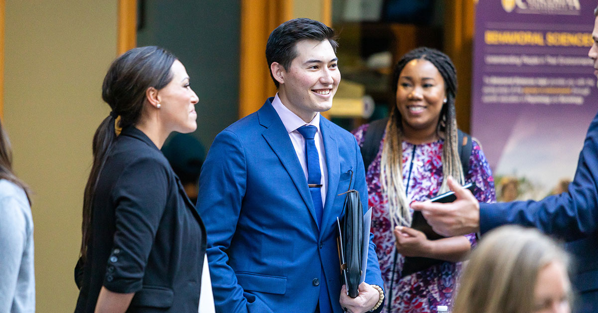 College students networking at career fair