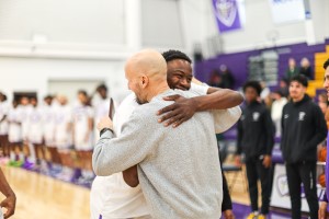 Coach Stan Bonewitz and his student-athletes at a game