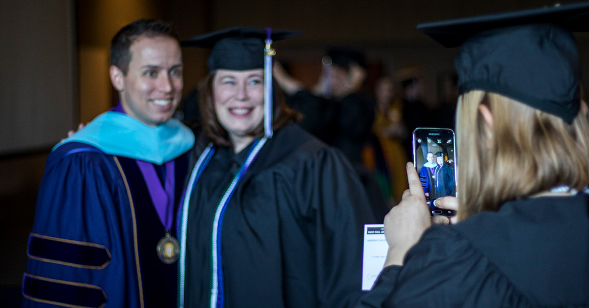 Taking Photo at Concordia Graduation