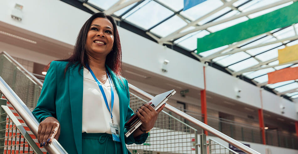 Image features a lead teacher in a school environment.