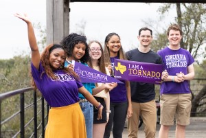 A group of Concordia Texas students excited to join the Tornado Nation