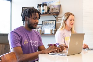 CTX Students working on a storyboard for a project