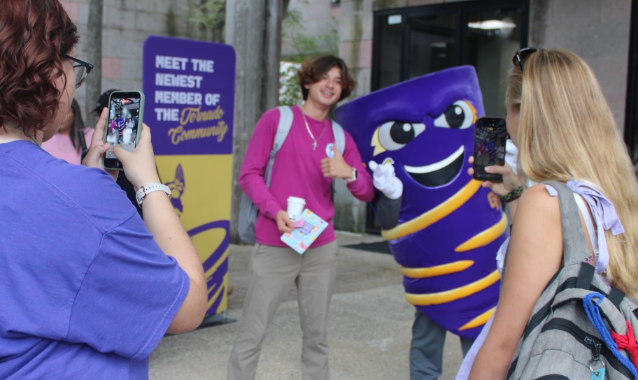 Concordia students getting pictures with Vortex
