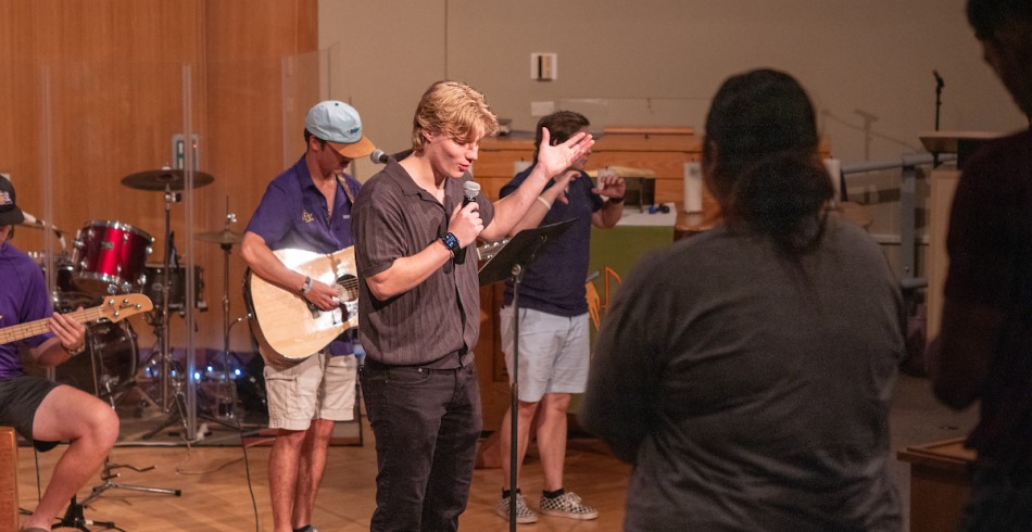 Students in Chapel leading a Refuge service