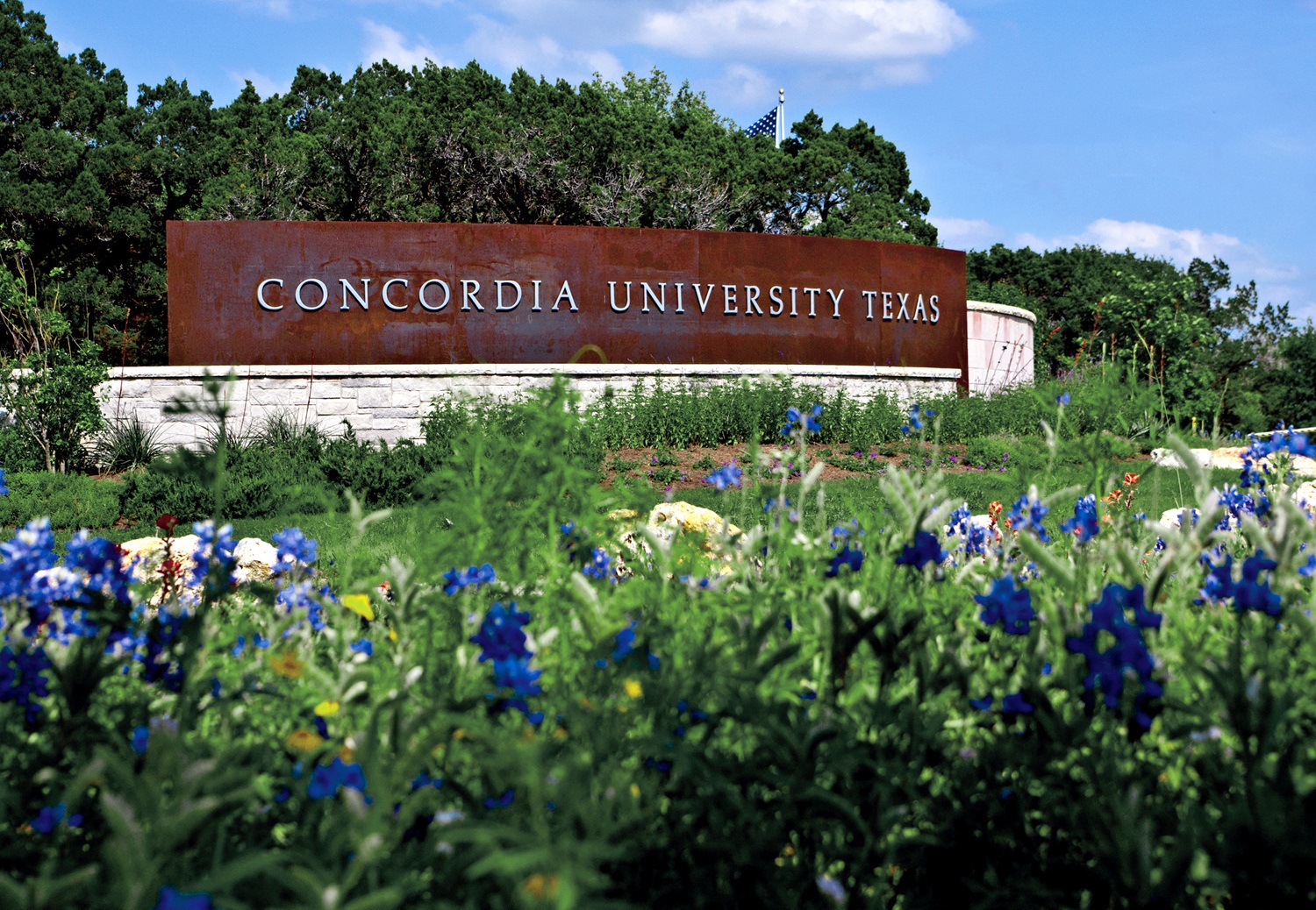 Concordia Sign with Flowers